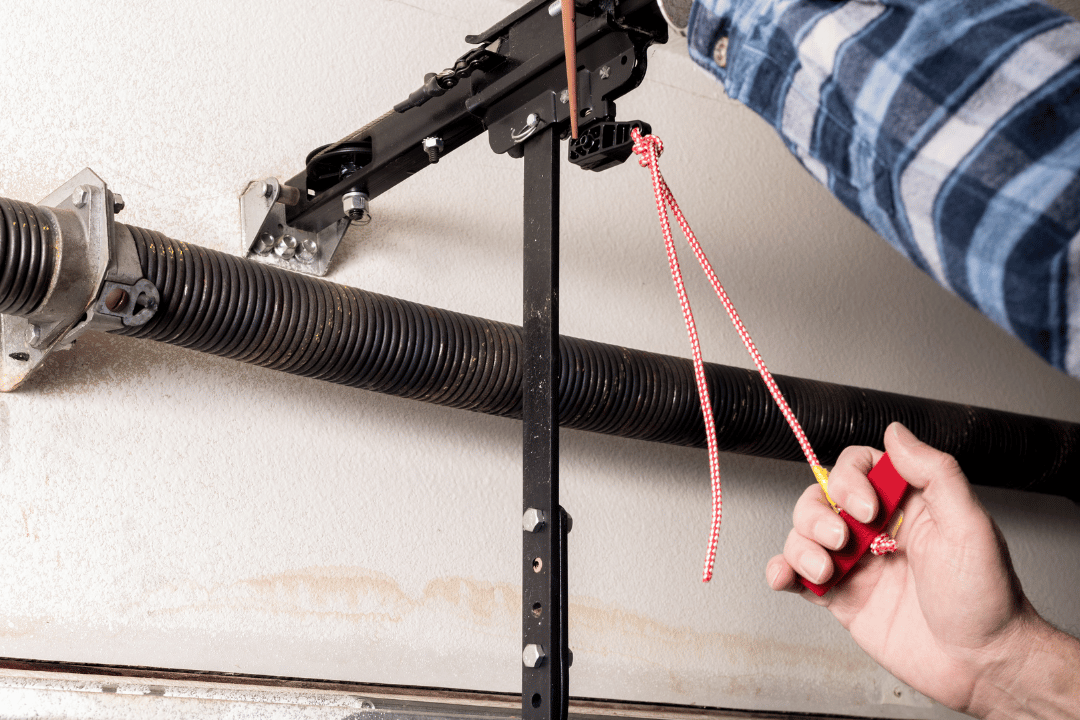 snapped garage door cable on track